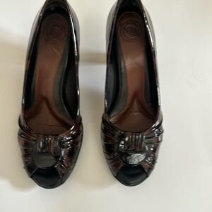 Leopard print pumps, barely worn, peek a boo toe, size 7.5